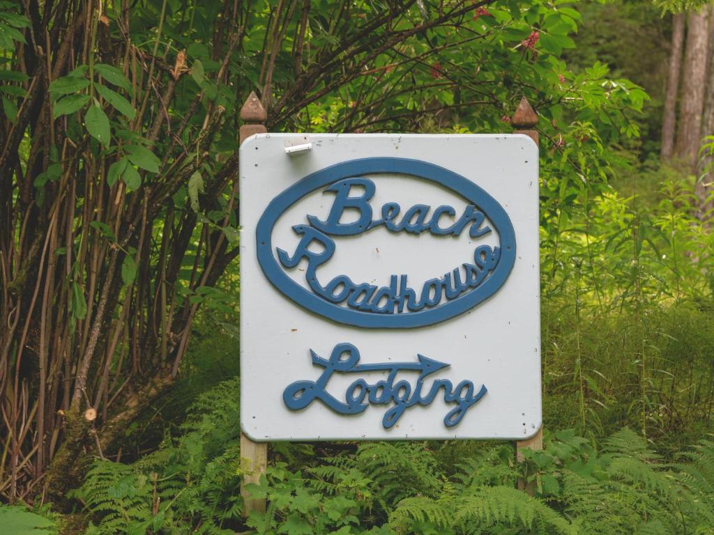 a sign for a bagelatownatown lodge at Beach Roadhouse in Haines
