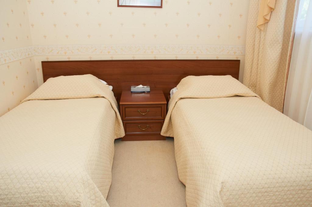 Postel nebo postele na pokoji v ubytování Морський