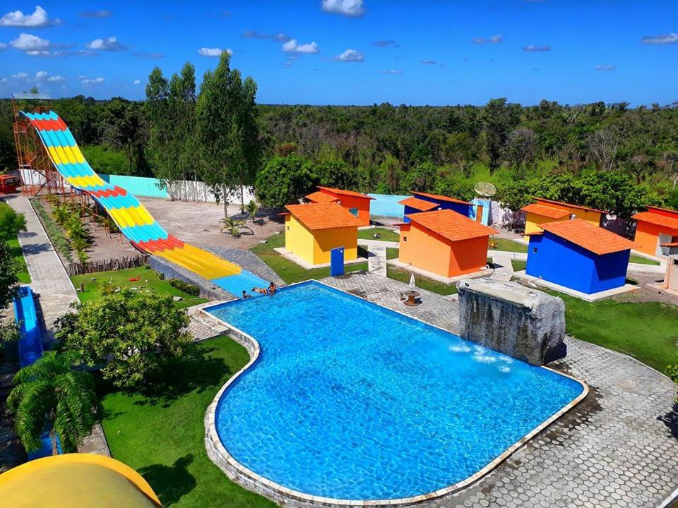 an aerial view of a water park with a slide at Torre do Sol Park Hotel in Chapadinha