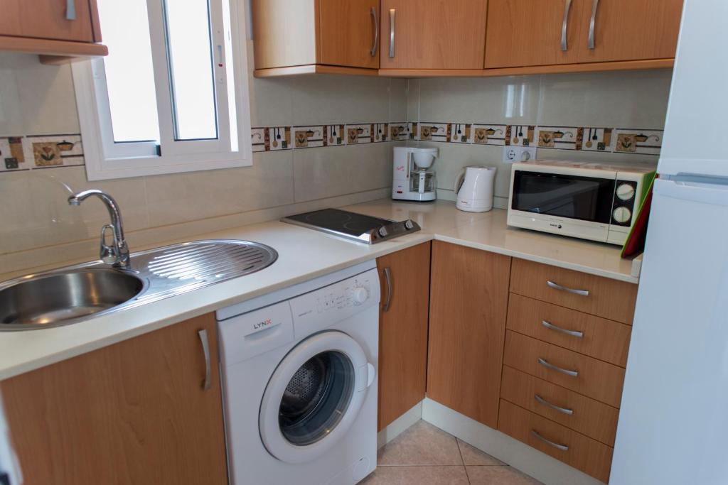 Kuchyň nebo kuchyňský kout v ubytování Apartamento junto el mar