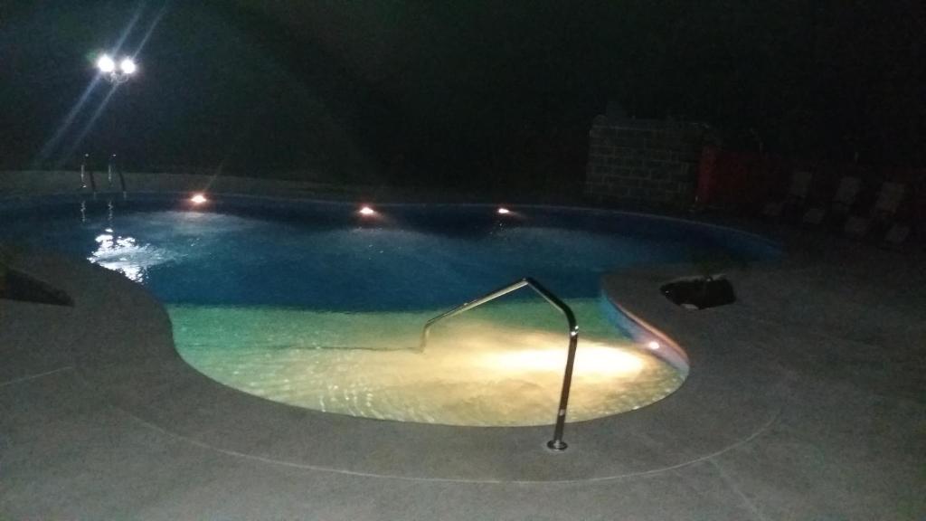 Bazén v ubytování Cabañas San Isidro nebo v jeho okolí