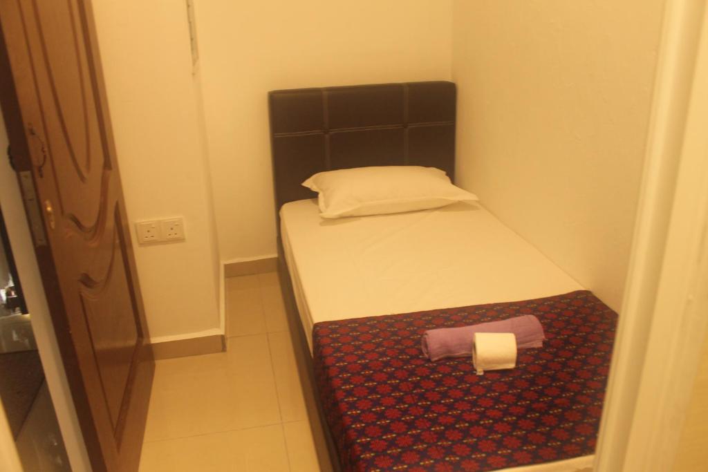 Postel nebo postele na pokoji v ubytování Georgetown Heritage Motel