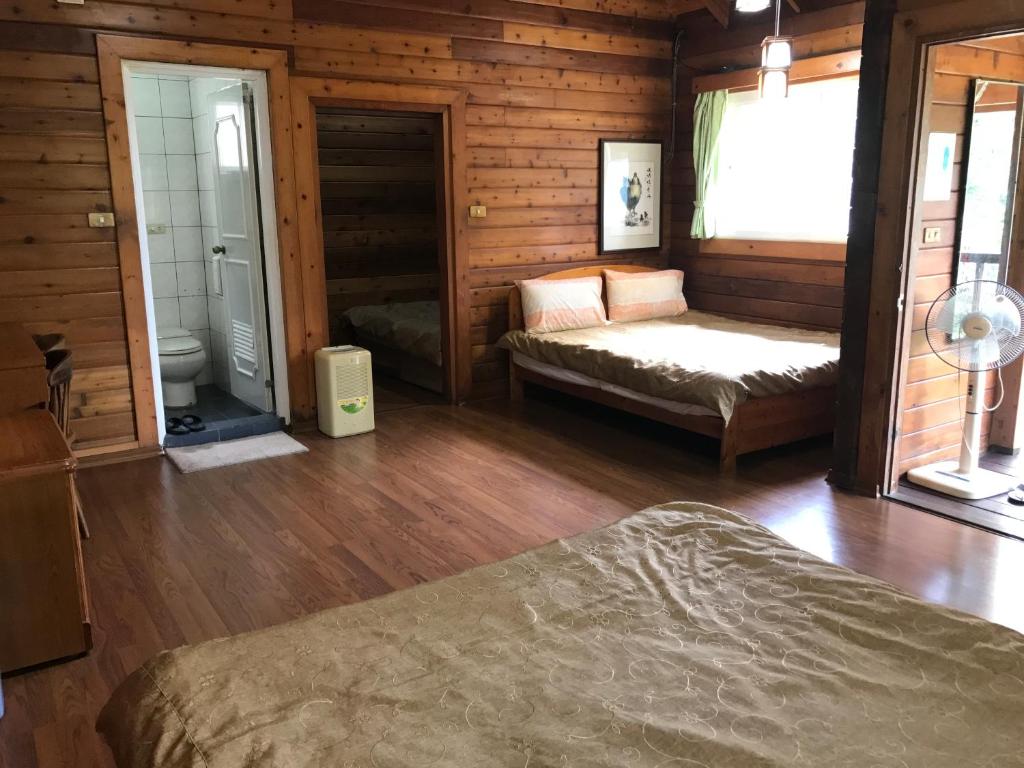 Postel nebo postele na pokoji v ubytování Jin Zu Cottage