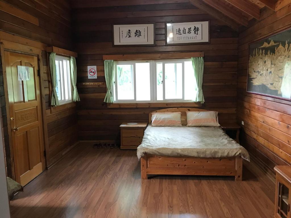 Postel nebo postele na pokoji v ubytování Jin Zu Cottage