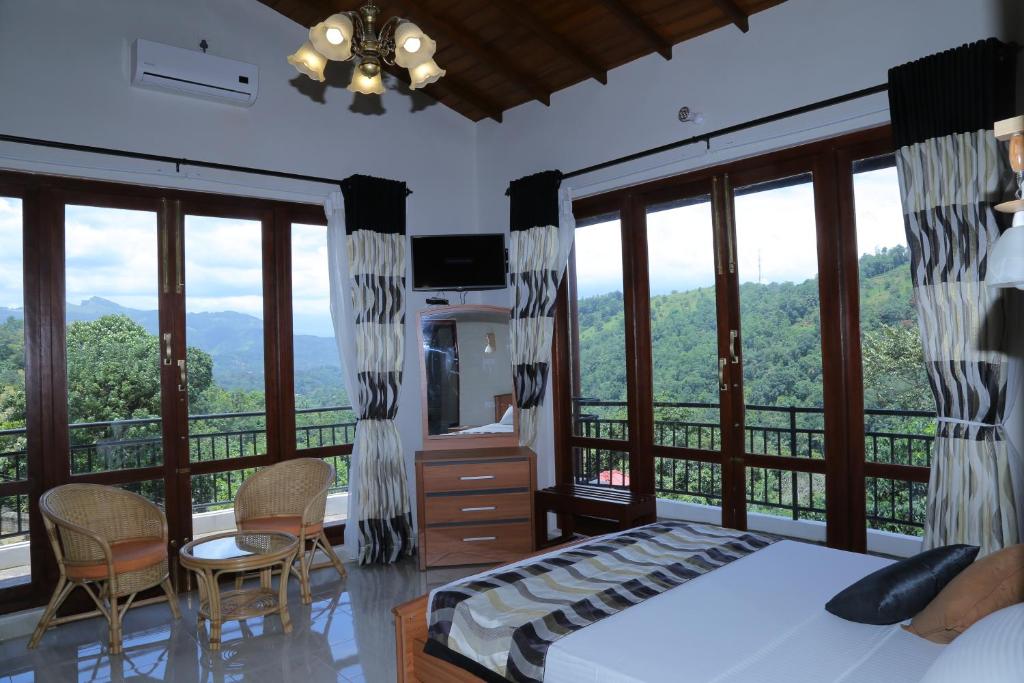 Postel nebo postele na pokoji v ubytování The Springfields Kandy Previously Madara Residence Kandy