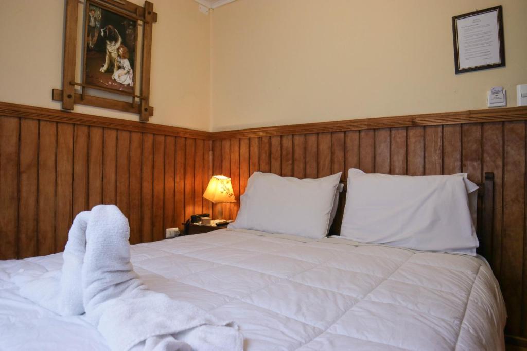 Postel nebo postele na pokoji v ubytování Hostal Hielo Sur