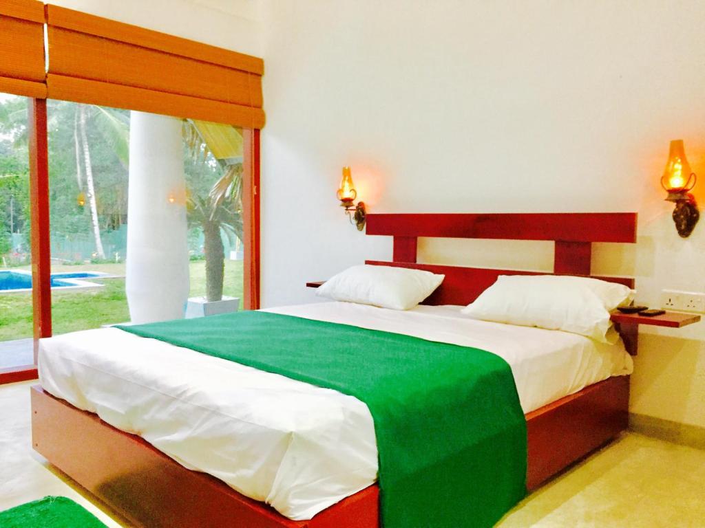 Postel nebo postele na pokoji v ubytování Airport Resort