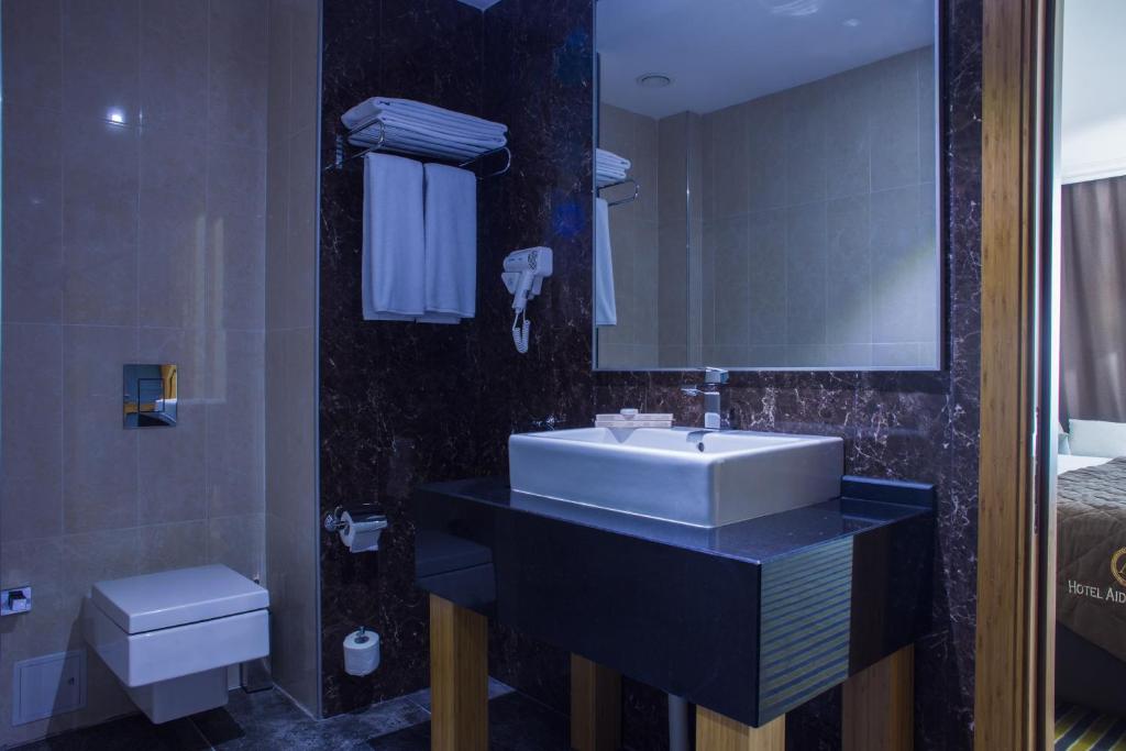 Koupelna v ubytování Aidana Plaza Hotel