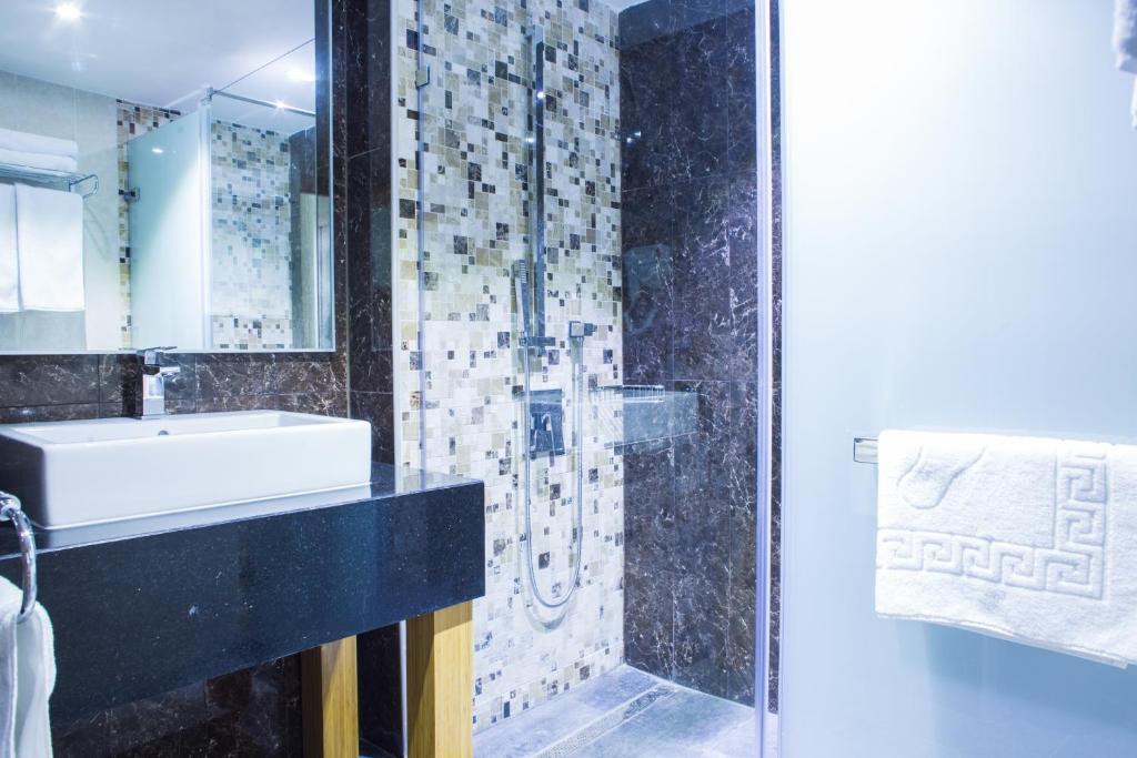 Postel nebo postele na pokoji v ubytování Aidana Plaza Hotel