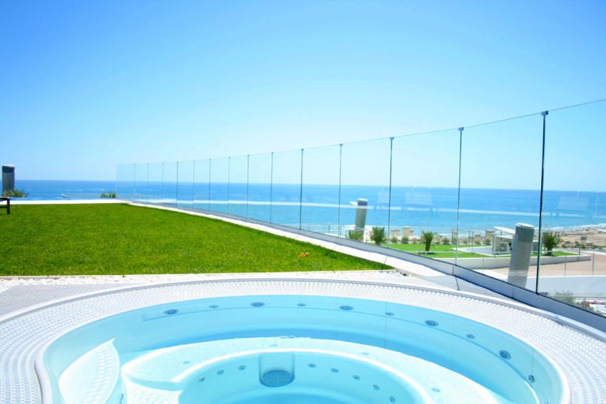 a swimming pool with a view of the ocean at Infinity View Paradise Apartment in Arenales del Sol