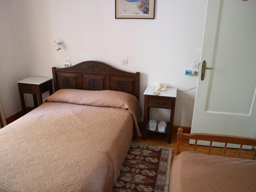 Postel nebo postele na pokoji v ubytování Acropolis House