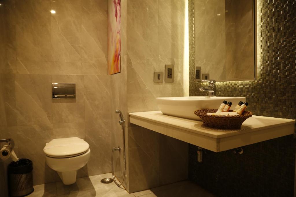 Koupelna v ubytování Hotel Orange