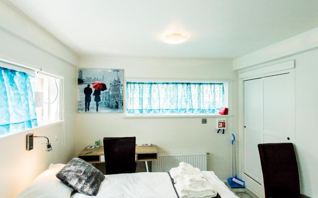 Postel nebo postele na pokoji v ubytování Guesthouse 77