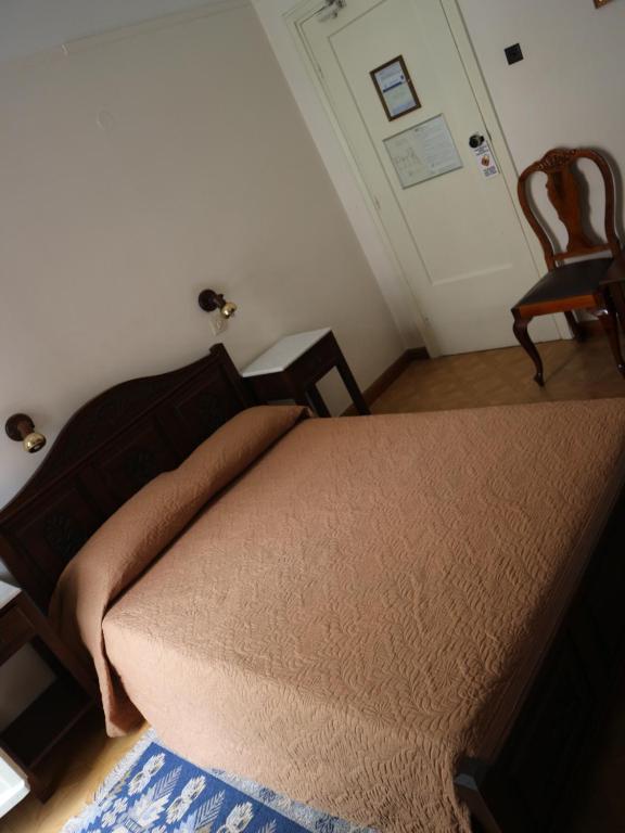 Postel nebo postele na pokoji v ubytování Acropolis House