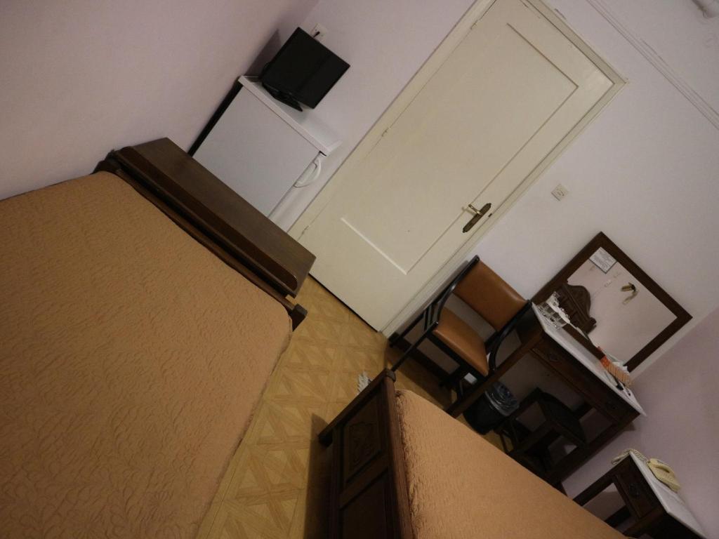 TV a/nebo společenská místnost v ubytování Acropolis House