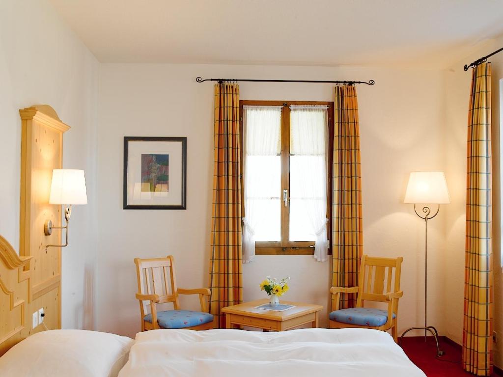 Postel nebo postele na pokoji v ubytování Hotel Bären