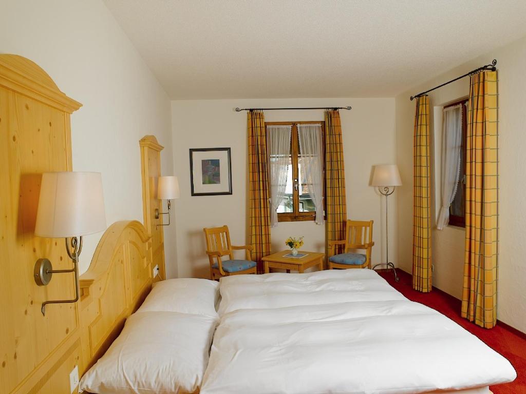 Postel nebo postele na pokoji v ubytování Hotel Bären