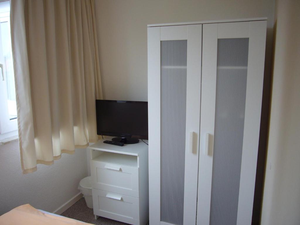 TV a/nebo společenská místnost v ubytování Aparthotel Klara