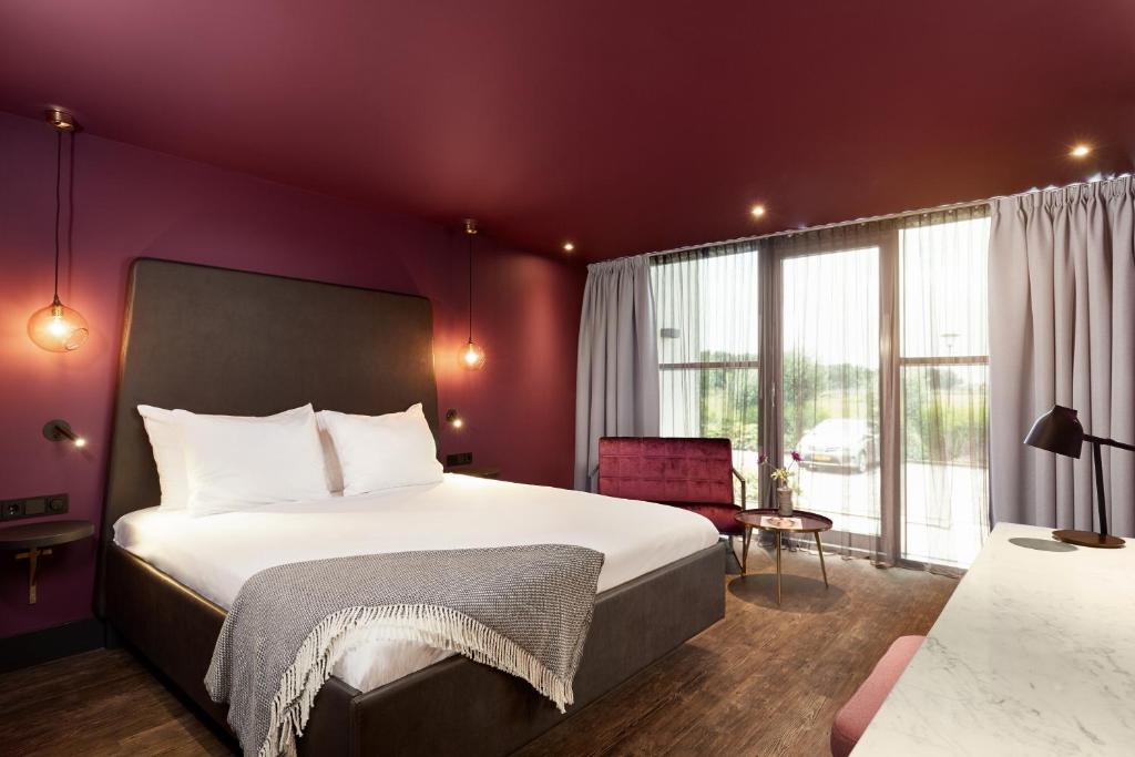 Postel nebo postele na pokoji v ubytování Van der Valk Hotel Sassenheim - Leiden