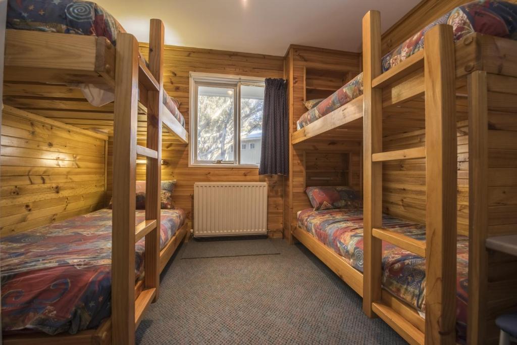 Postel nebo postele na pokoji v ubytování TERAMA Ski Lodge