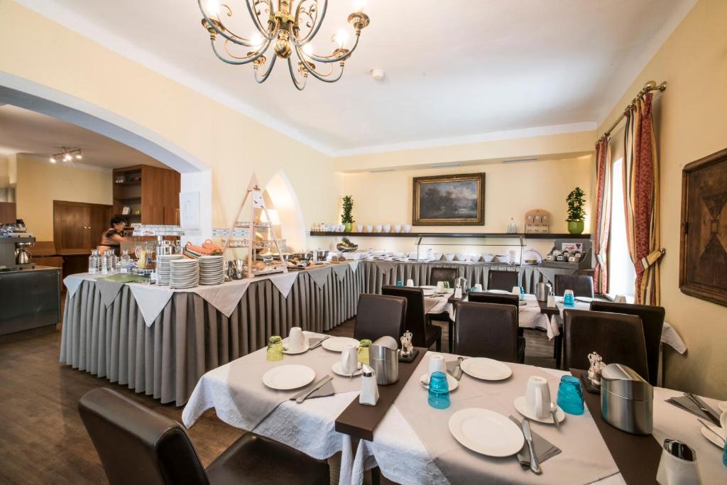 Een restaurant of ander eetgelegenheid bij Stadthotel Kramer