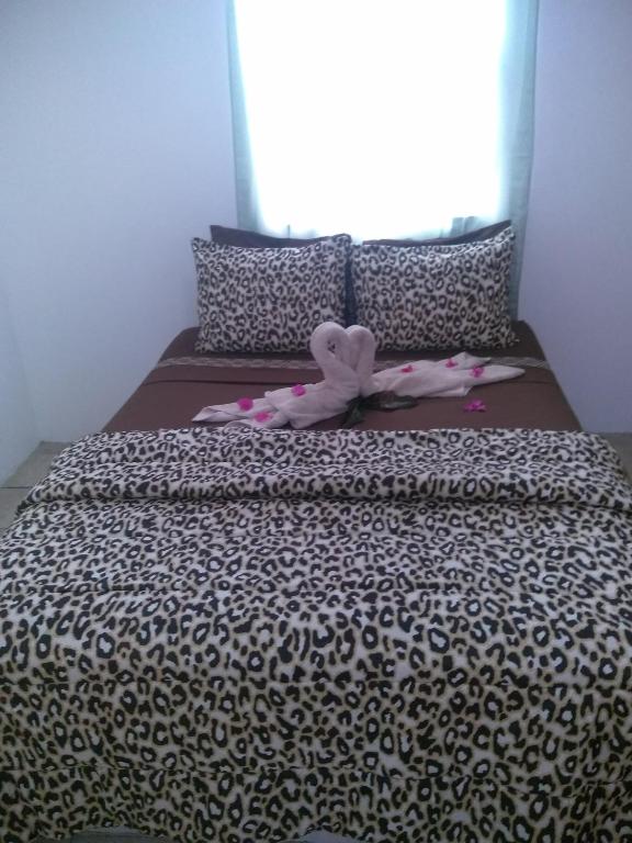 Letto o letti in una camera di Caribbean Dream Vacation Property CD1