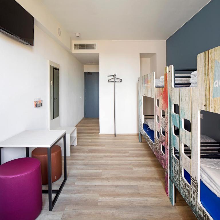 Postel nebo postele na pokoji v ubytování a&o Hostel Venezia Mestre