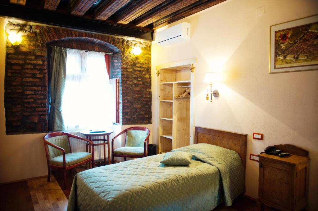 Postel nebo postele na pokoji v ubytování Casa Wagner