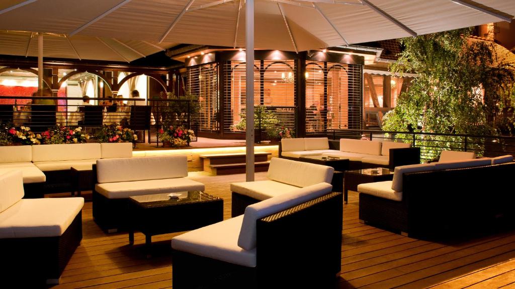 Posezení v ubytování Logis Hotel Le Parc & Spa
