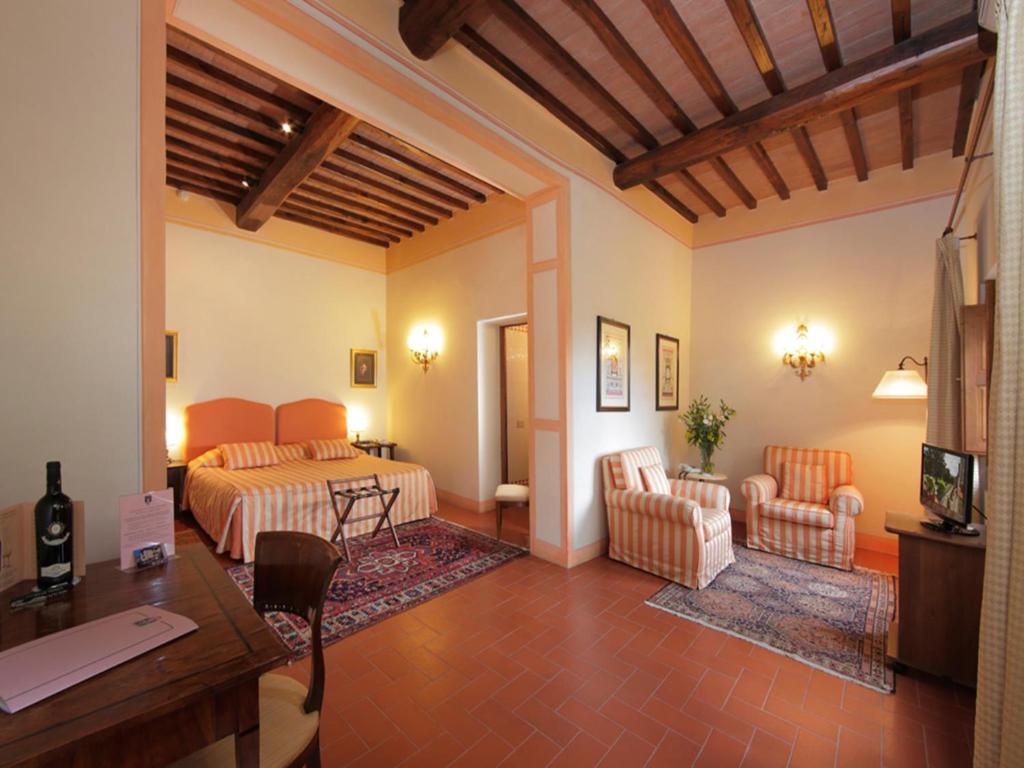 Posteľ alebo postele v izbe v ubytovaní Relais Vignale & Spa