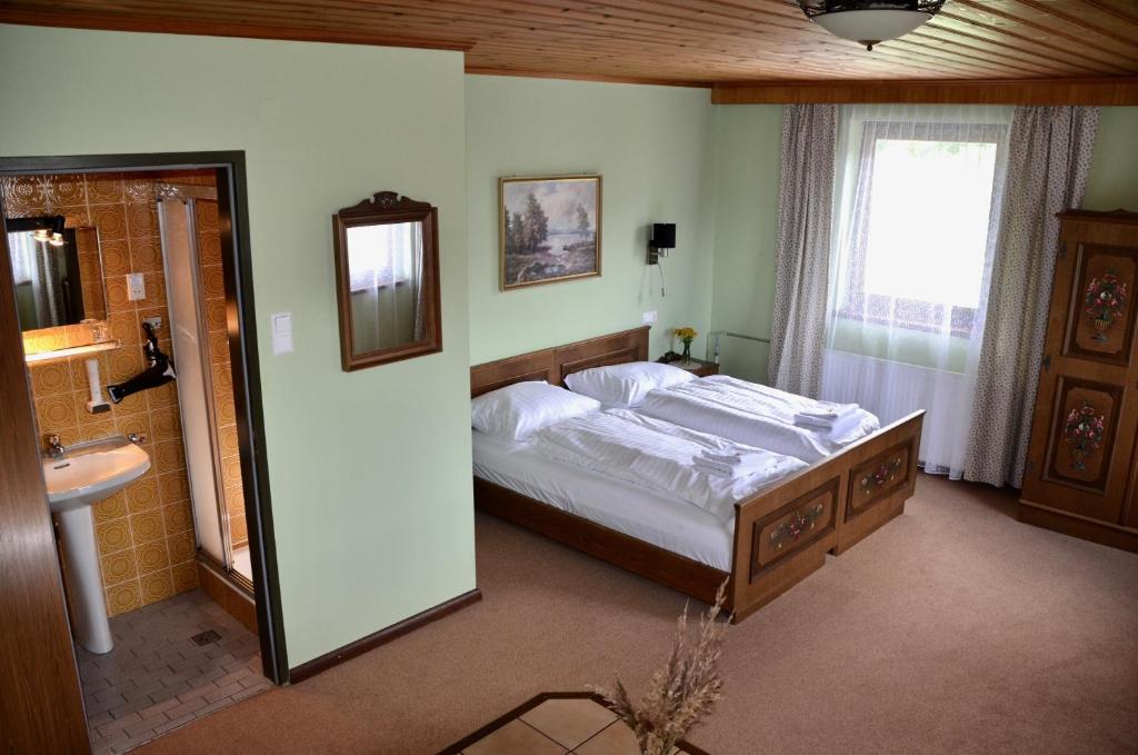 Postel nebo postele na pokoji v ubytování Locus Malontina Hotel