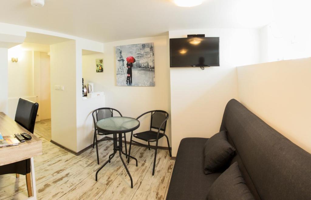 TV a/nebo společenská místnost v ubytování Guesthouse 77