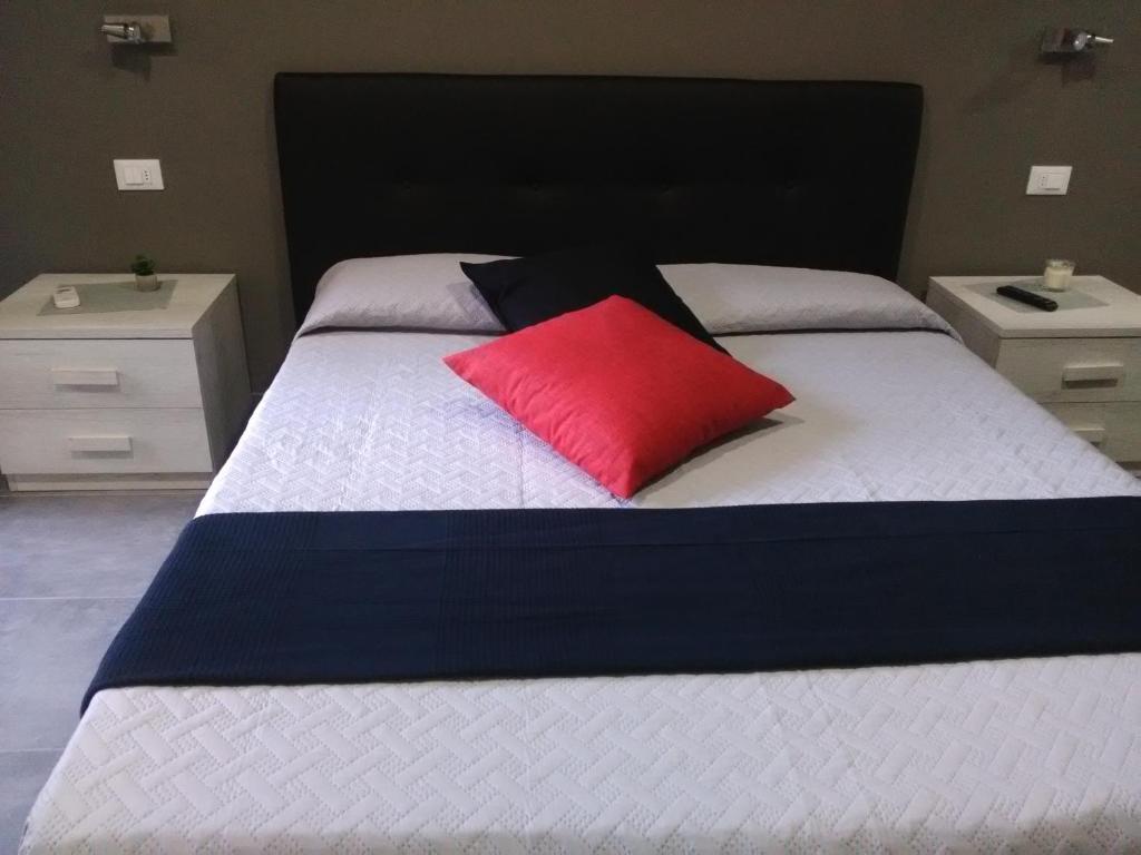 Letto o letti in una camera di B&B La Grotta