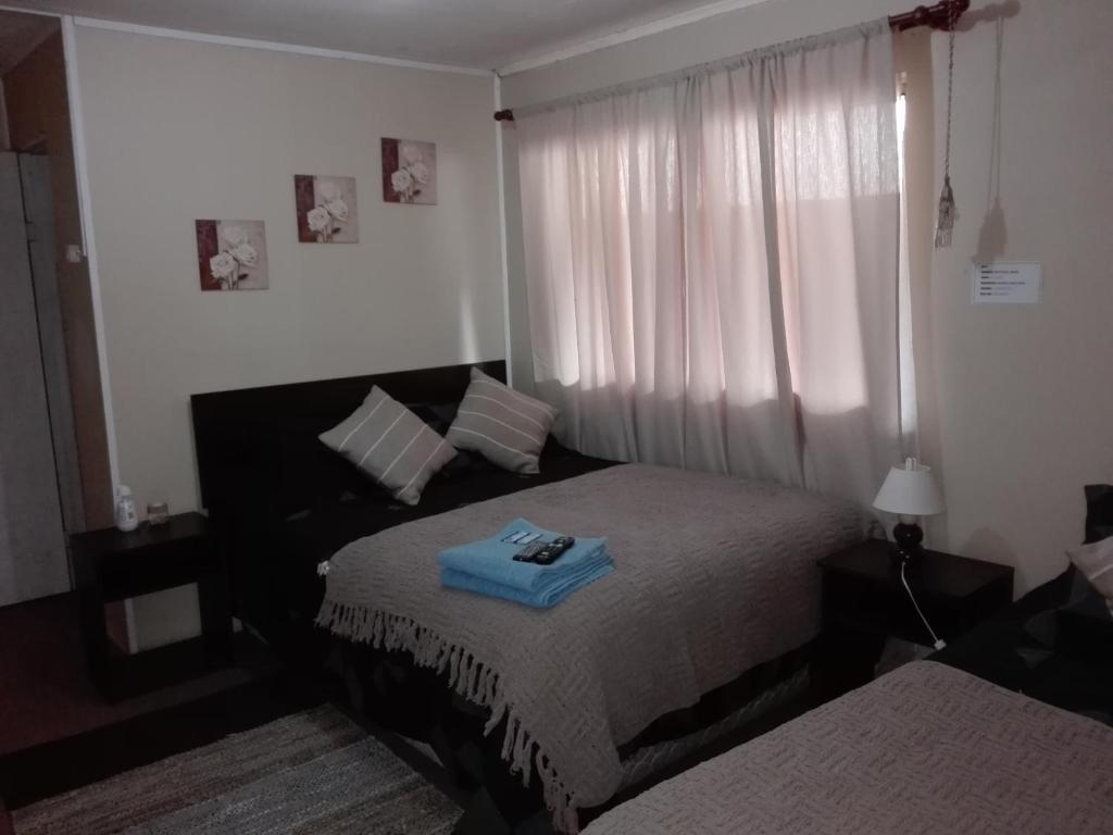 Katil atau katil-katil dalam bilik di Hostal Los Guindos