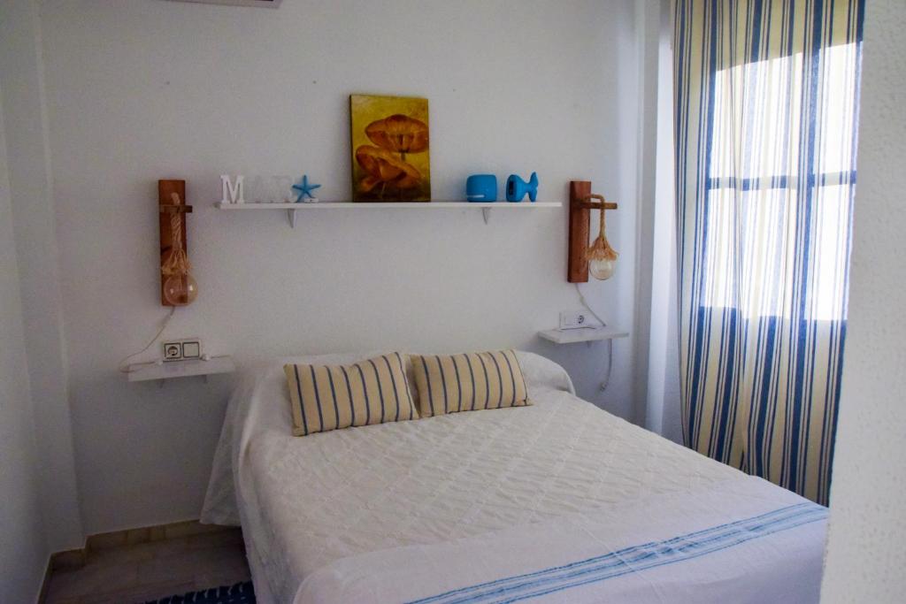 Postel nebo postele na pokoji v ubytování Vem Al Puerto De Santa Maria