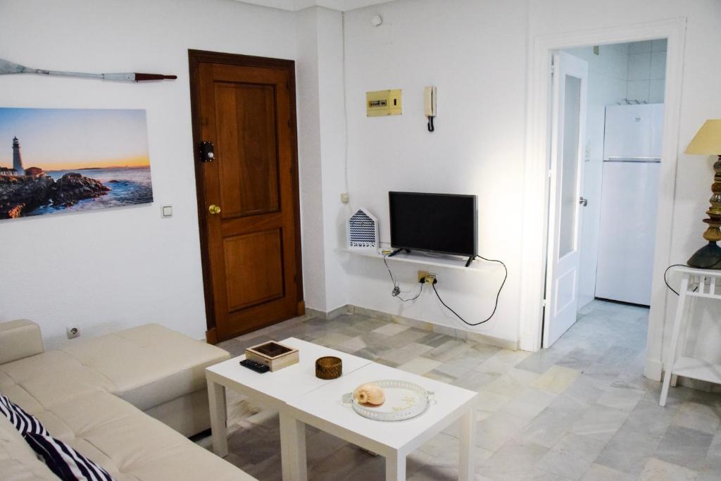 TV a/nebo společenská místnost v ubytování Vem Al Puerto De Santa Maria
