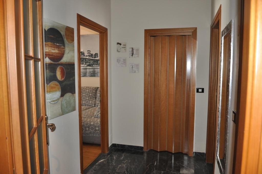 A bed or beds in a room at Appartamento Nino