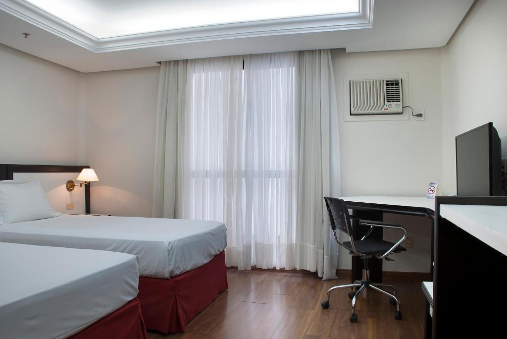 Master Grande Hotel - Próximo ao Palácio do Governo - Triple Room With One Double Bed And One Single Bed