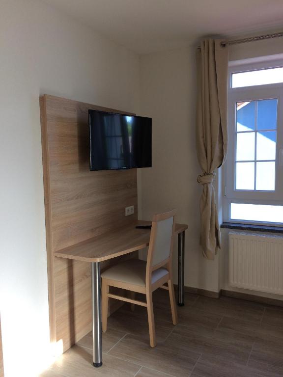 TV a/nebo společenská místnost v ubytování Hotel Mezzero