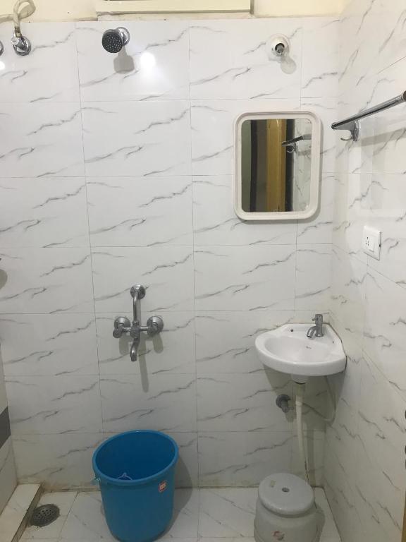 Koupelna v ubytování Suvarna Compact