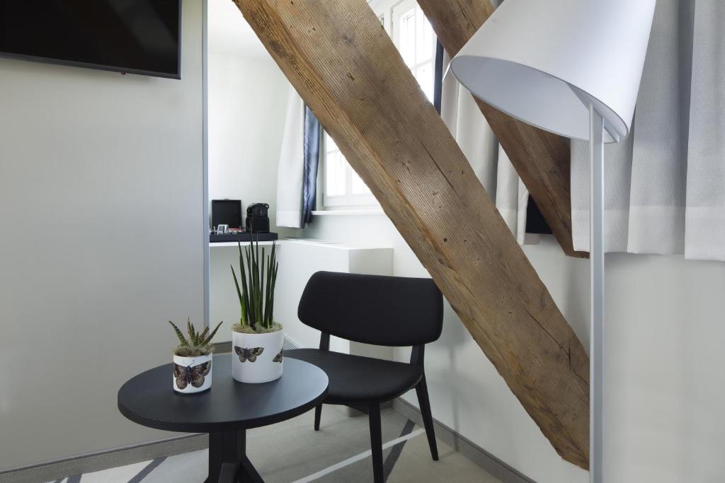 TV a/nebo společenská místnost v ubytování Boutique Hotel Des XV