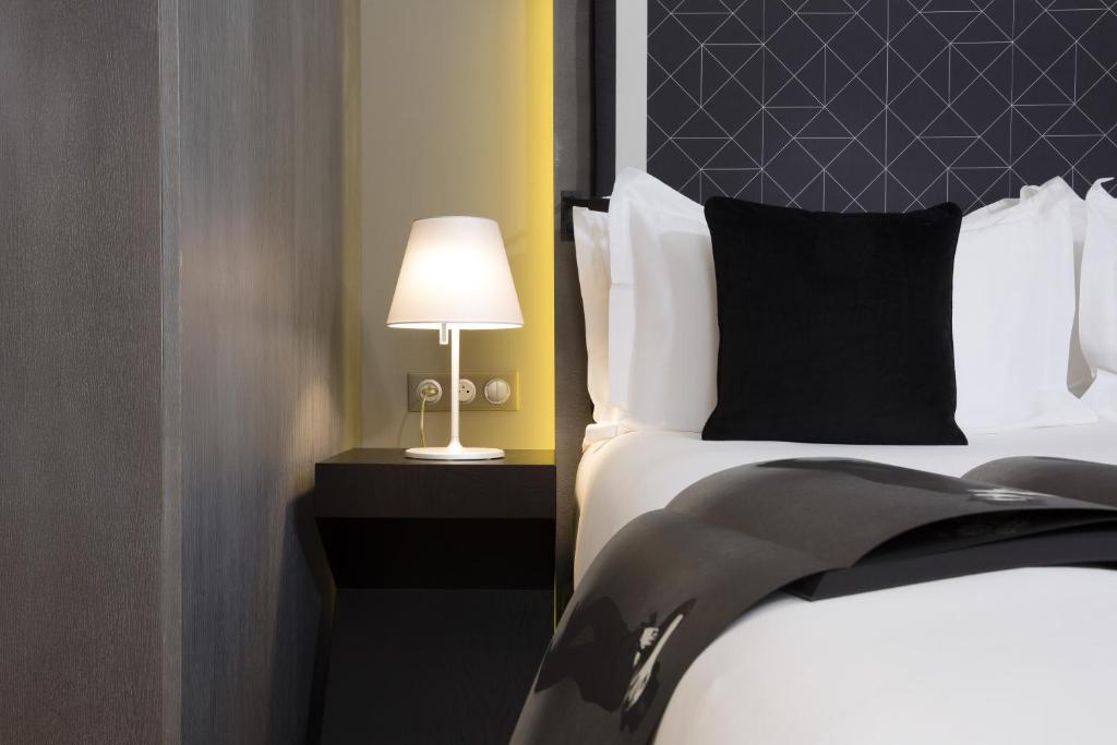 Postel nebo postele na pokoji v ubytování Boutique Hotel Des XV