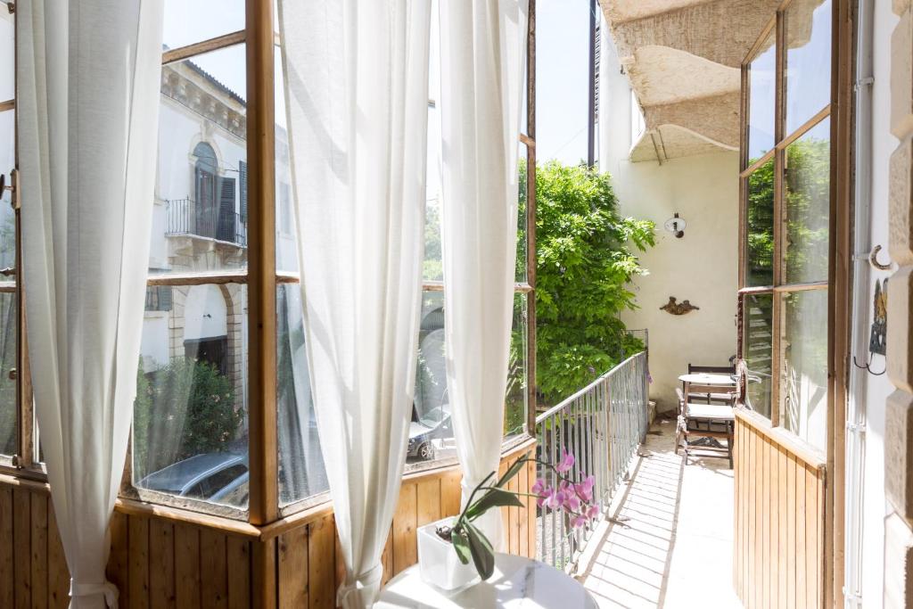Balkón nebo terasa v ubytování Palazzo Fracastoro