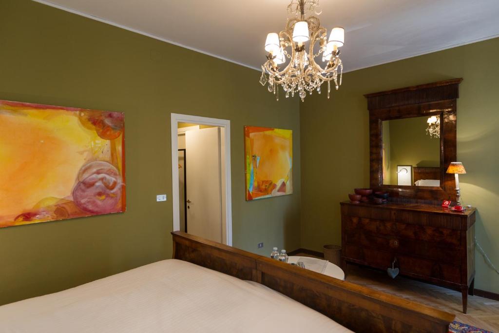 Postel nebo postele na pokoji v ubytování Palazzo Fracastoro