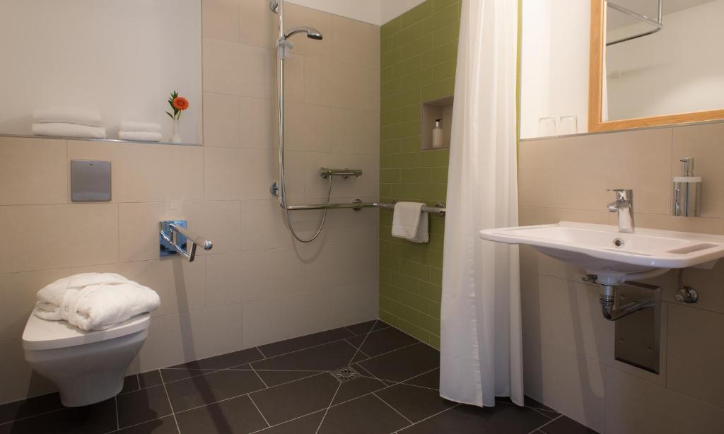 Koupelna v ubytování Hotel Christophorus