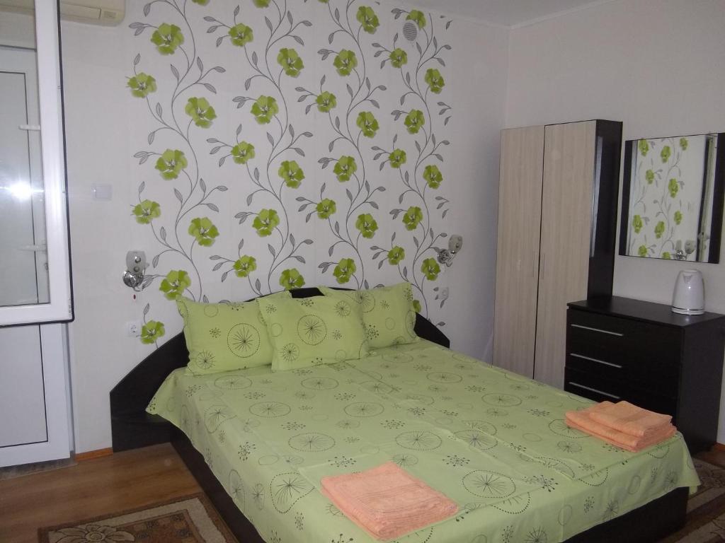 Postel nebo postele na pokoji v ubytování Sakutski House