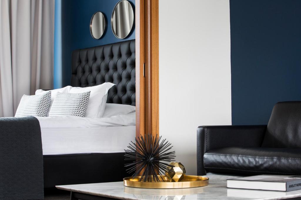 Cama o camas de una habitación en Room With a View Apartments