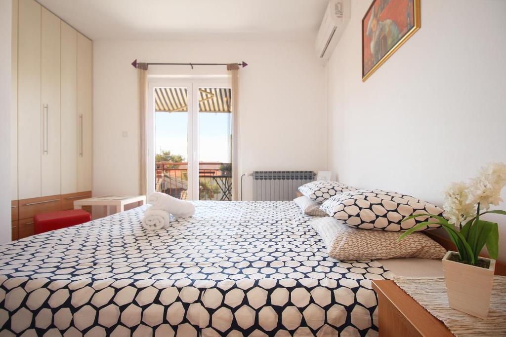Postel nebo postele na pokoji v ubytování Guesthouse Marta