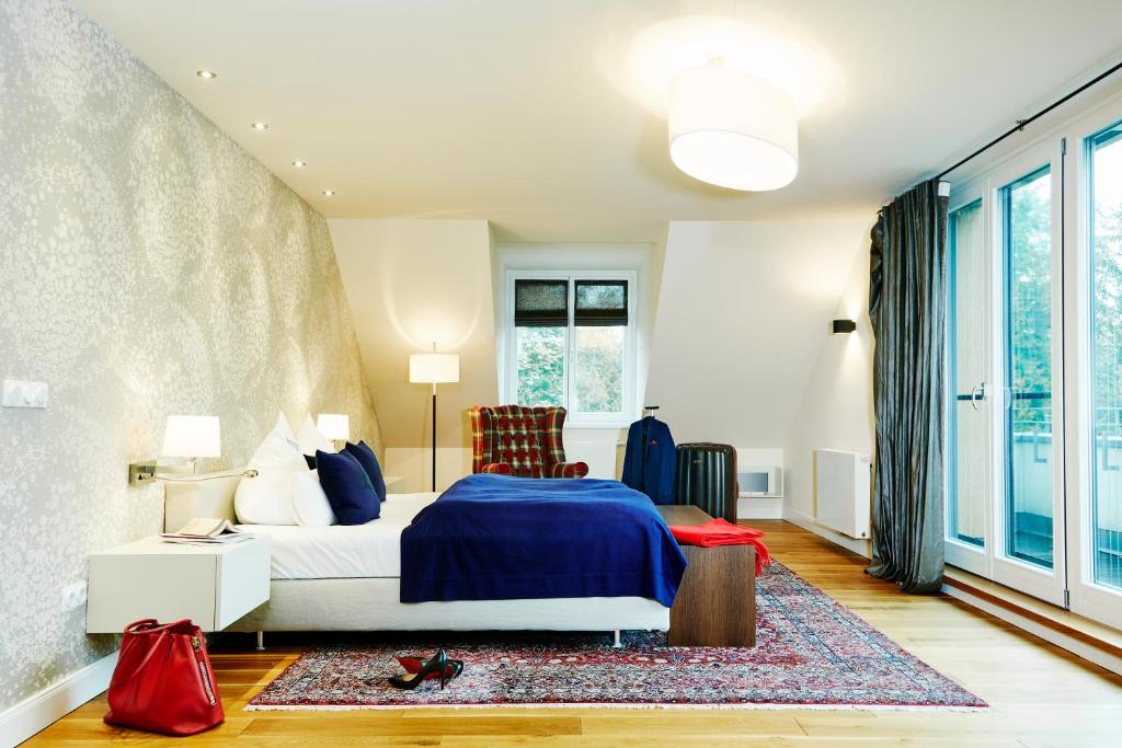 Postel nebo postele na pokoji v ubytování Hubertus Hof Landhotel