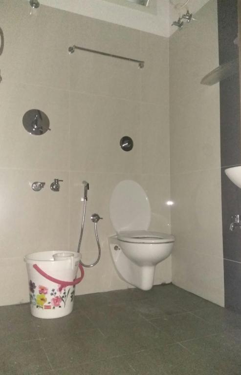 Koupelna v ubytování Aashraya Homestay